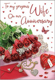 In this richly detailed anniversary card image, a romantic tableau is arranged with the same thoughtful touch you might expect from an Enfield Wash florist preparing flowers for a milestone celebration. Dominating the scene is a cluster of red roses, their velvety petals unfurling in full, rounded blooms, each one layered and plush, as if you could feel their softness just by imagining your fingertips brushing across them. The roses are supported by fresh greenery, slender leaves curving and overlapping to create a natural frame of soft green tones, enhancing the intensity of the deep reds. Nestled beside this floral focal point lies an envelope, creamy and smooth, evoking the promise of loving words penned late at night. A heart-shaped keepsake box sits nearby, its polished surface reflecting a gentle glow, as though it holds a cherished ring or small token from a special evening at a favourite local restaurant. A piece of delicate jewellery, perhaps a necklace or bracelet, is arranged in a gentle curve, its metallic sheen catching pinpoint reflections of light. Scattered across the surface are miniature heart decorations and sparkling accents, creating the sense of a celebration frozen in a single tender moment. A solitary butterfly motif adds a soft, whimsical touch, like a symbol of transformation and shared journeys. The lighting is mellow and romantic, casting tender shadows and gentle highlights across the card, while the colour palette blends passionate reds with soft blushes and subtle creams, making the entire composition feel like a quiet, heartfelt anniversary message brought beautifully to life.